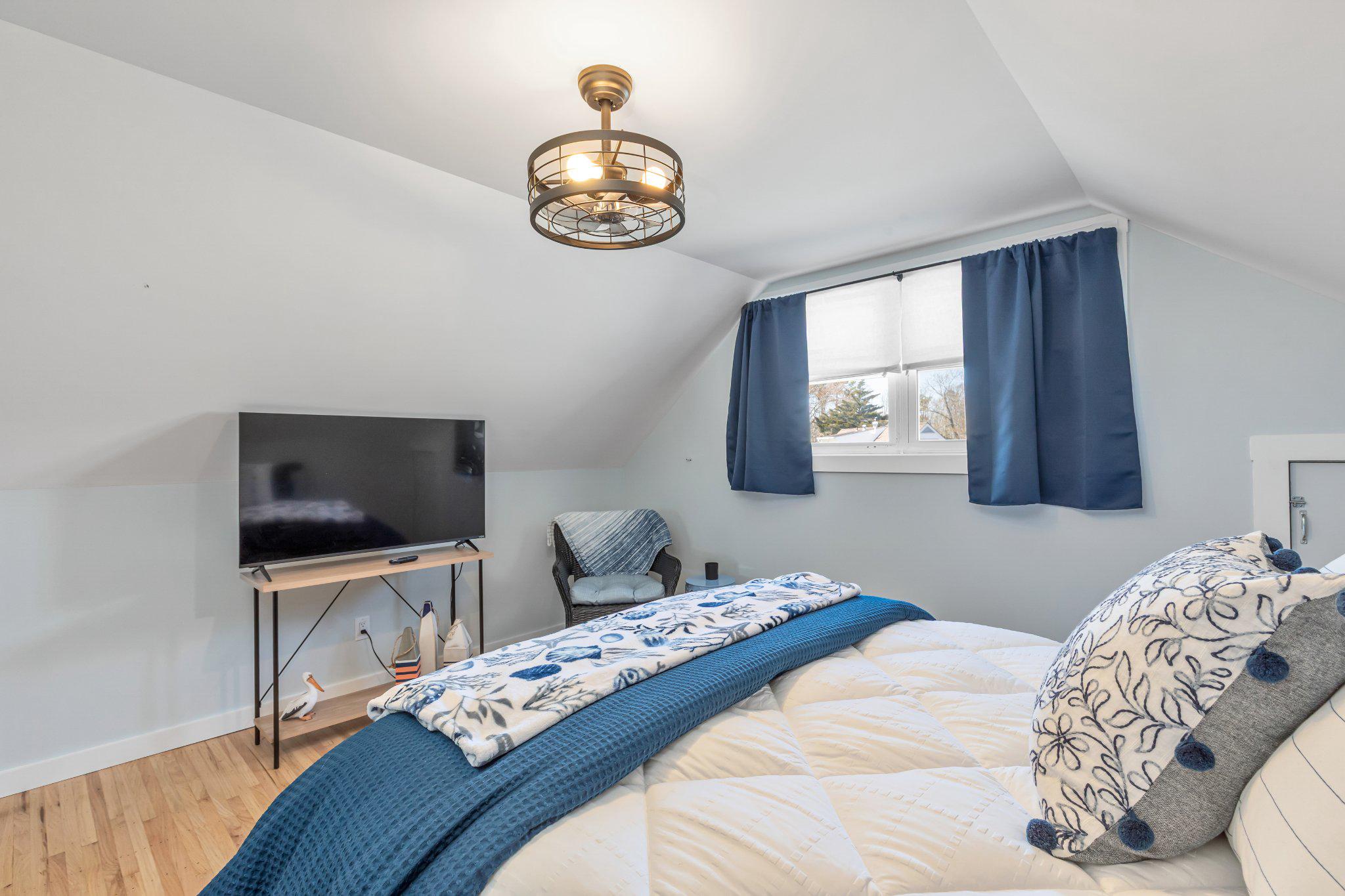 126 Colwick Drive Somers Point, NJ 08244 - Photo 28 of 46 a bedroom with a bed and a flat screen tv