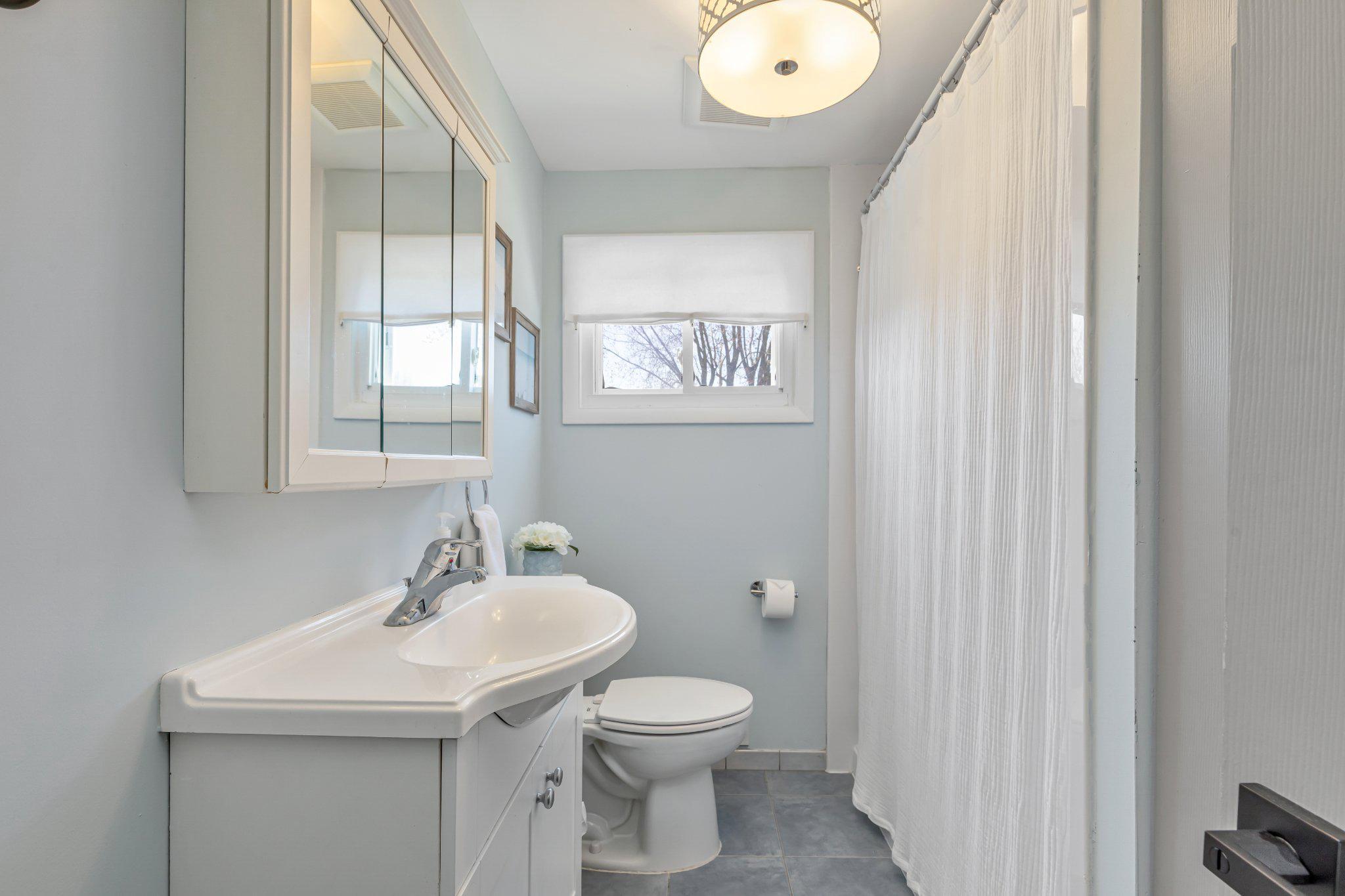126 Colwick Drive Somers Point, NJ 08244 - Photo 30 of 46 a bathroom with a sink a mirror and a toilet