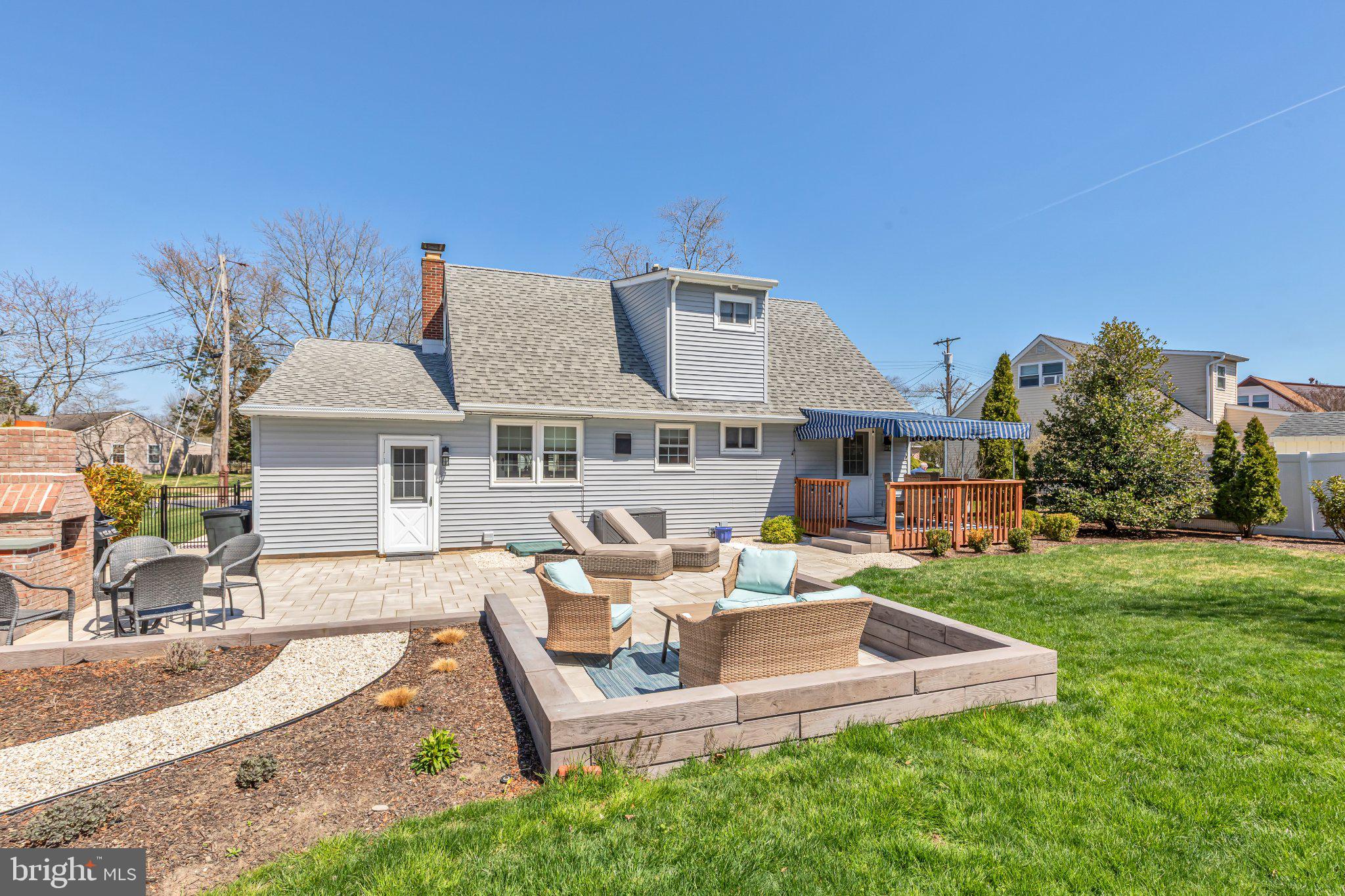 126 Colwick Drive Somers Point, NJ 08244 - Photo 38 of 46 a view of a house with backyard sitting area and garden
