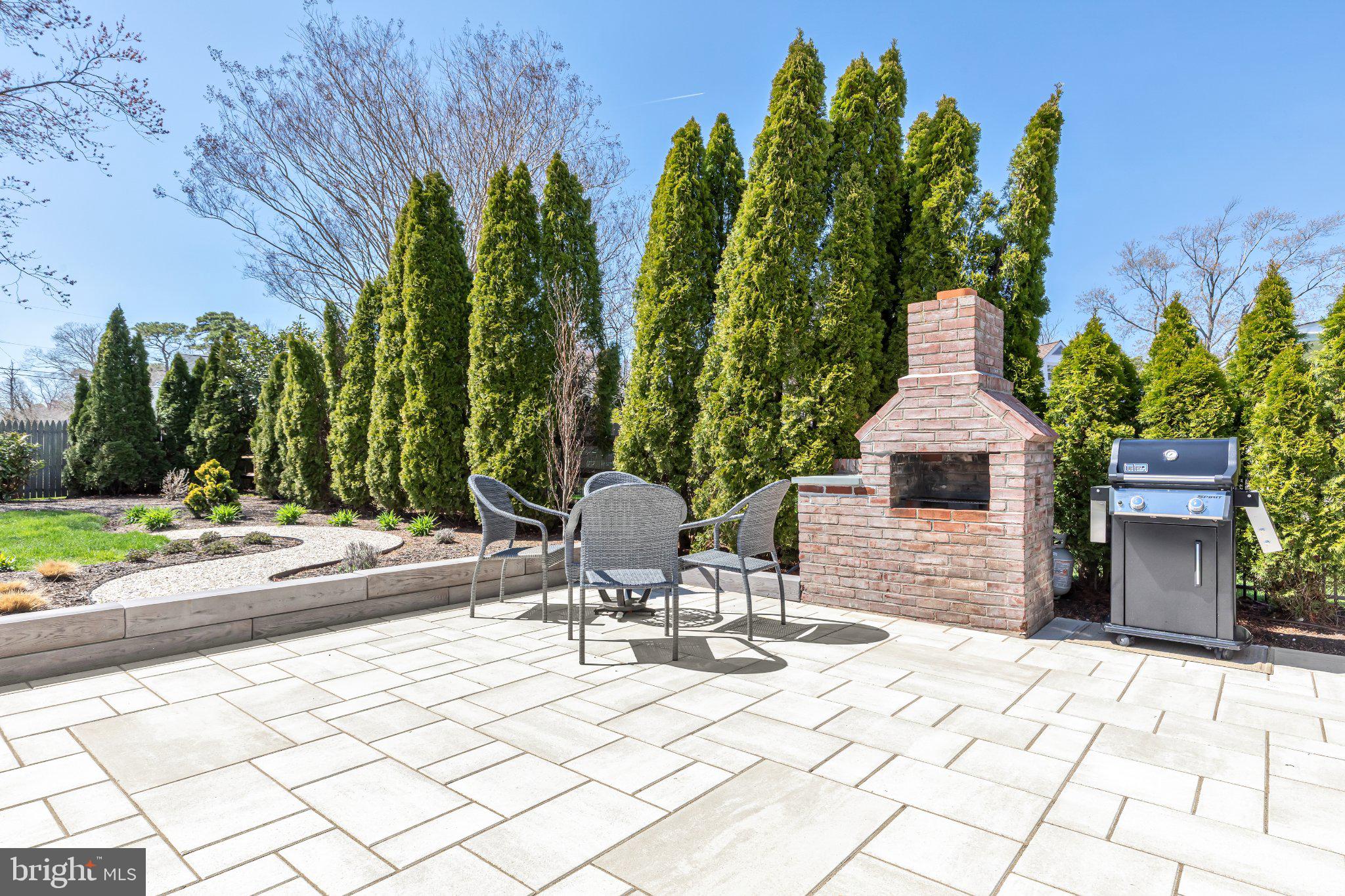 126 Colwick Drive Somers Point, NJ 08244 - Photo 40 of 46 Charming patio with lush greenery.