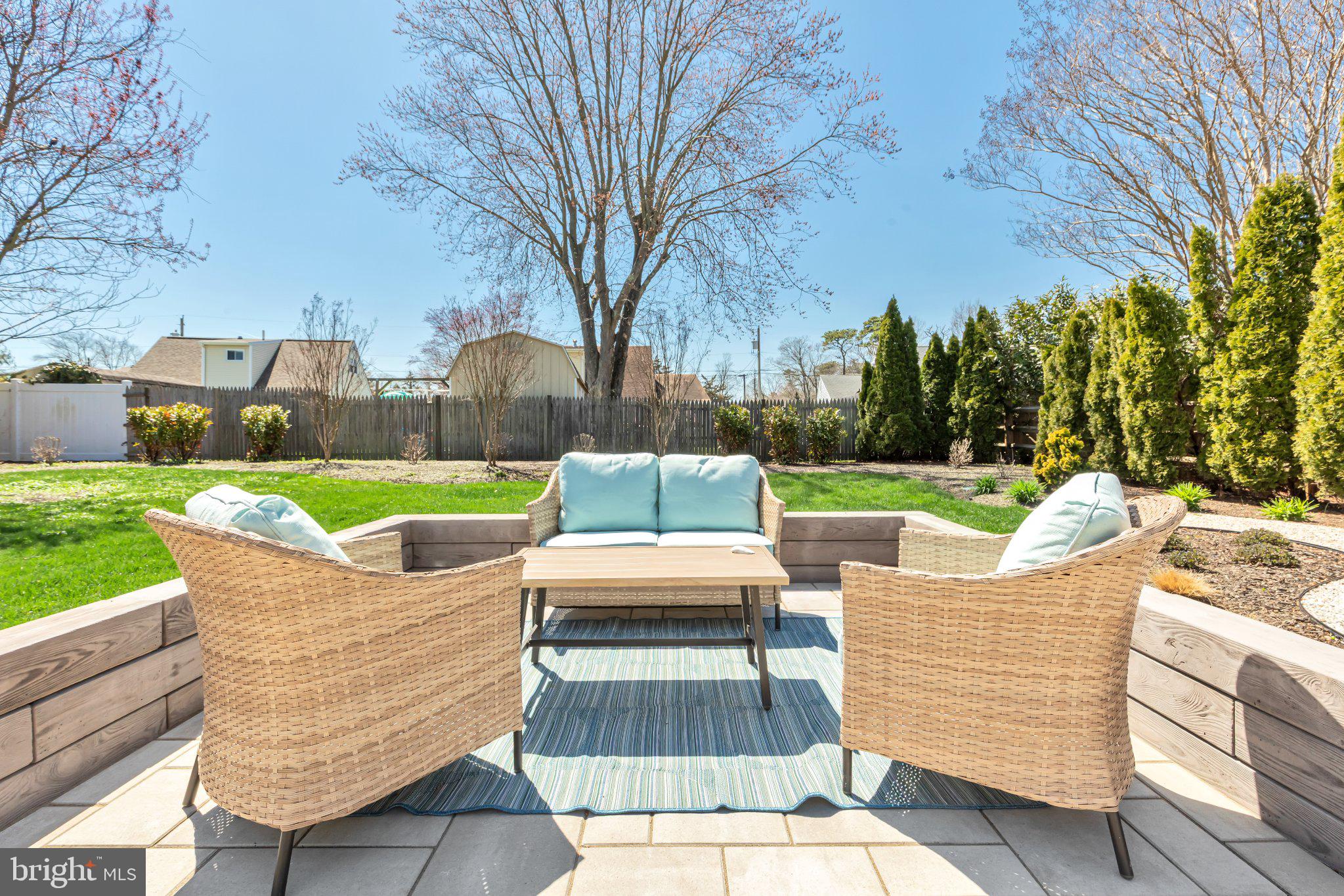126 Colwick Drive Somers Point, NJ 08244 - Photo 42 of 46 a view of a chairs in backyard of a house