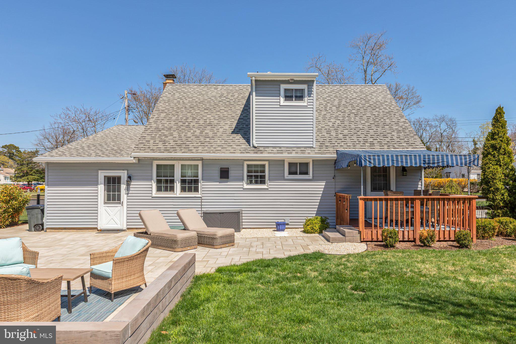 126 Colwick Drive Somers Point, NJ 08244 - Photo 6 of 46 a front view of a house with a garden