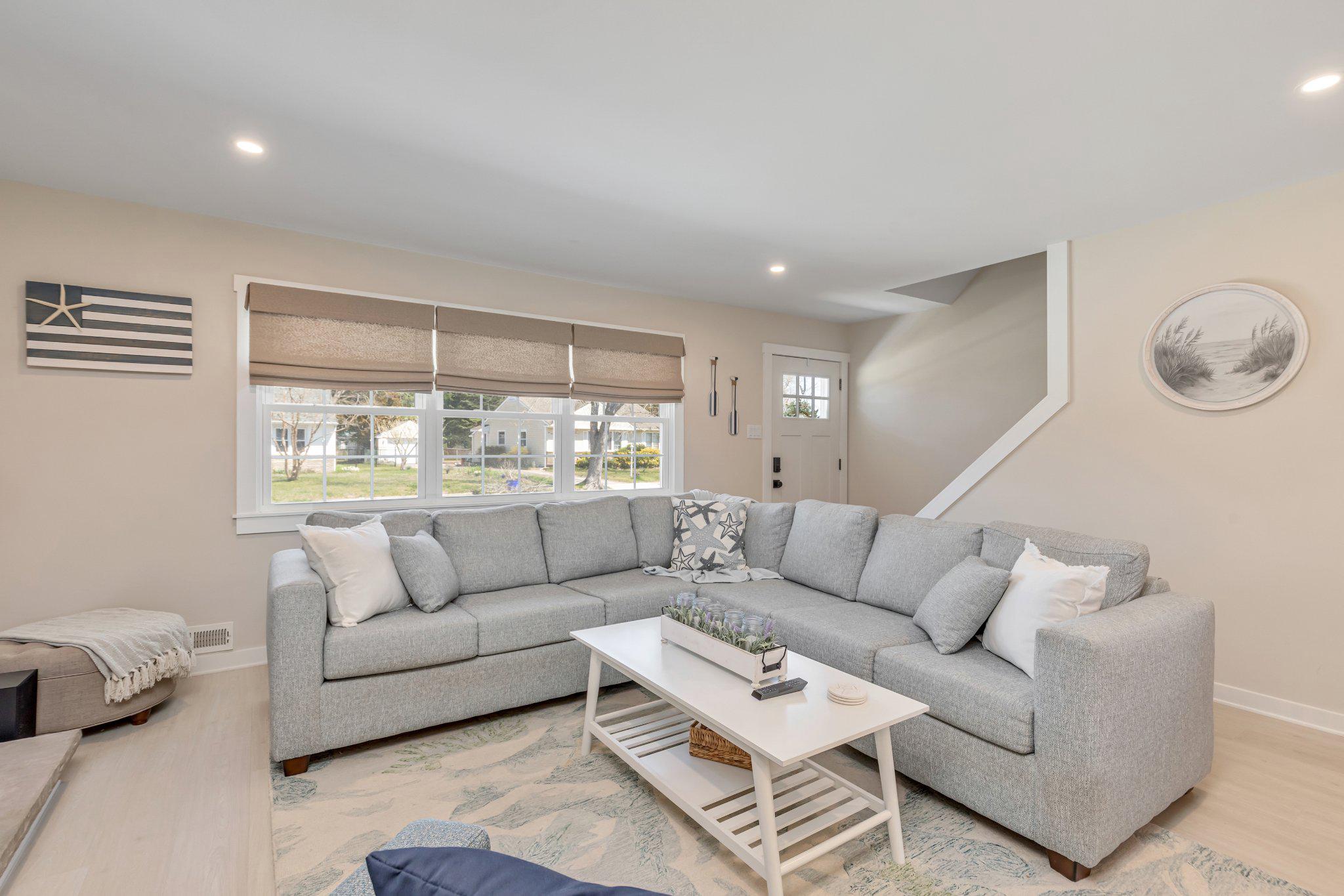 126 Colwick Drive Somers Point, NJ 08244 - Photo 10 of 46 a living room with furniture and a large window