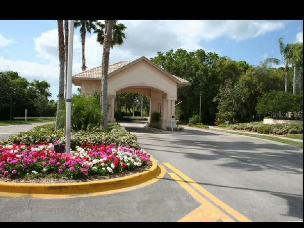 a view of a golf course with a house