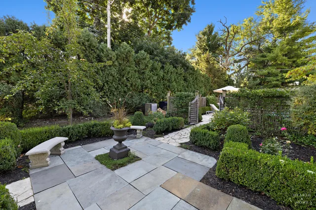 a patio with table and chairs