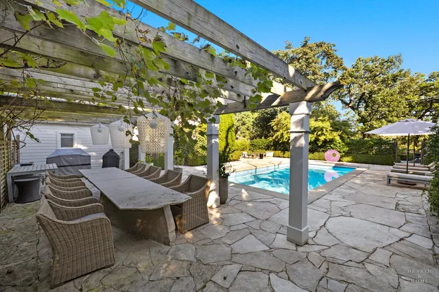 a living room with furniture and next to a window