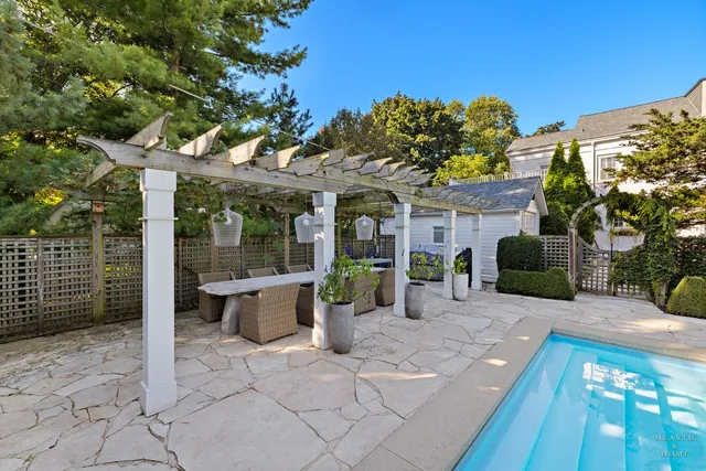 a view of a water fountain in front of the house