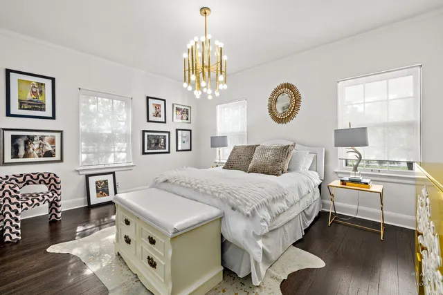 a bathroom with a toilet a sink and a mirror