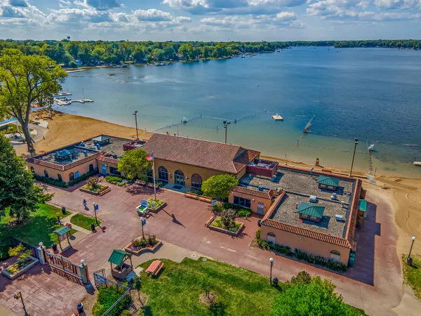 an aerial view of a house with a lake view