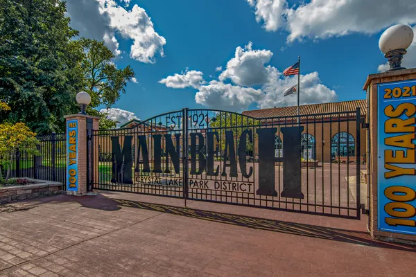 a view of a porch with wooden fence