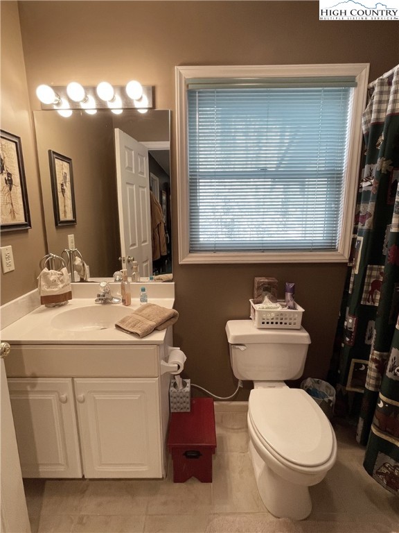 710-708 Pine Ridge Road Beech Mountain, NC 28604 - Photo 29 of 42 a bathroom with a toilet sink and mirror