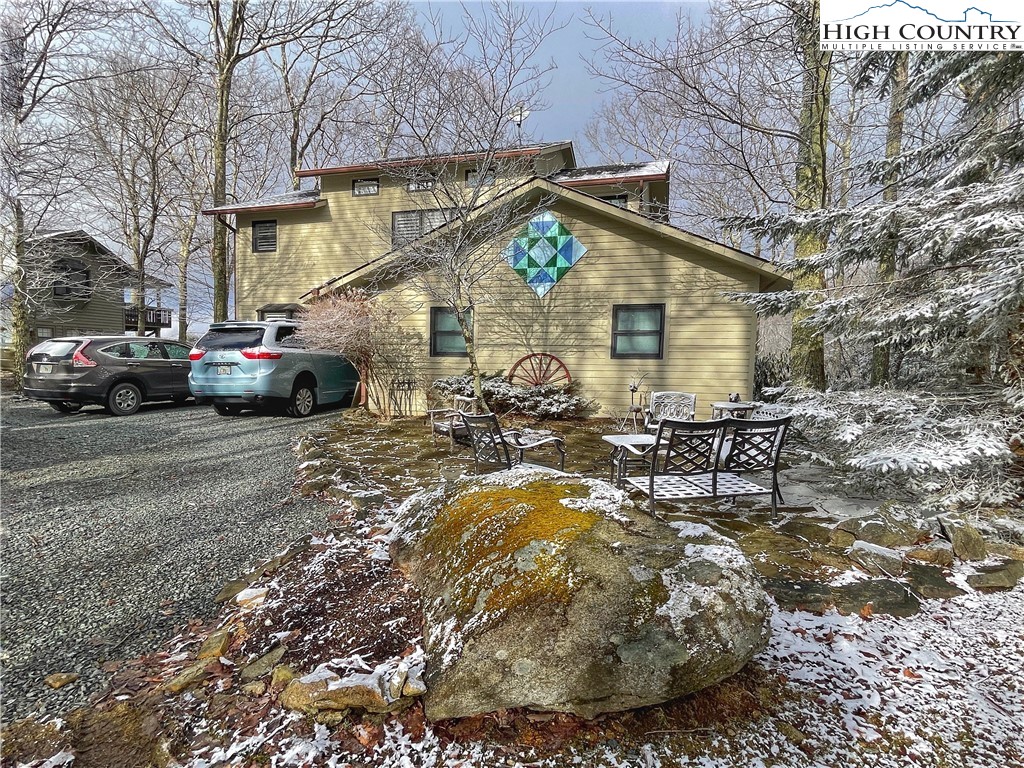 710-708 Pine Ridge Road Beech Mountain, NC 28604 - Photo 6 of 42 a view of a house with a patio