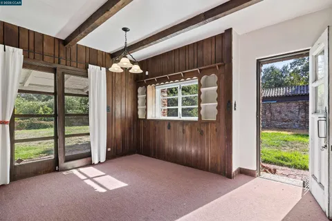 a view of empty room with front door