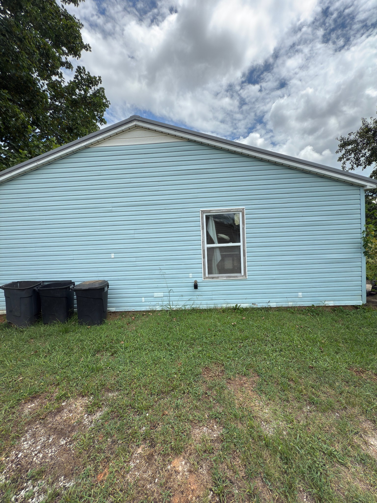 1105 Cumberland Street Decherd, TN 37324 - Photo 10 of 10 a backyard of a house with lots of green space