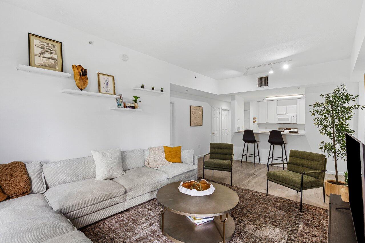 a living room with furniture and a table