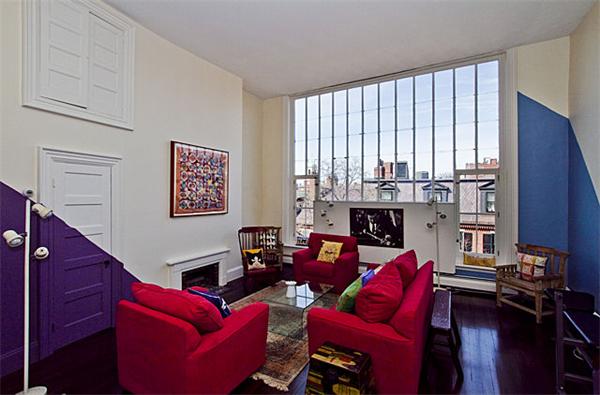 74 Chestnut Street Boston, MA 02108 - Photo 11 of 13 a living room with furniture a large window and a fireplace