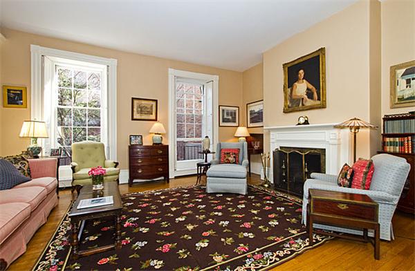 74 Chestnut Street Boston, MA 02108 - Photo 2 of 13 a living room with furniture a rug and a fireplace
