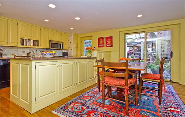 74 Chestnut Street Boston, MA 02108 - Photo 6 of 13 a dining room with stainless steel appliances a dining table and chairs