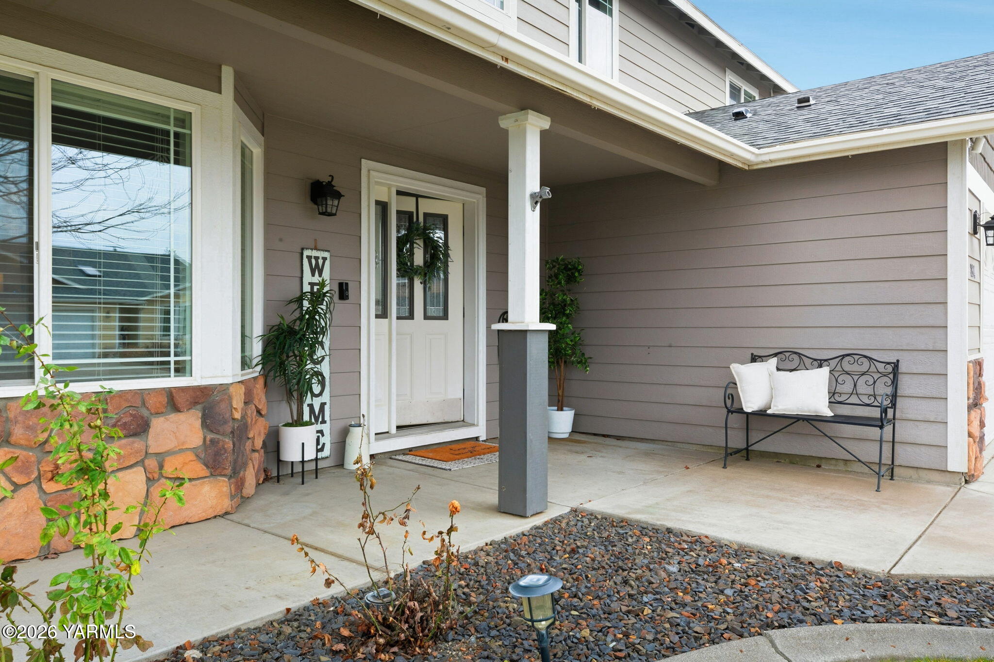 a outdoor living space with patio furniture and a potted plant