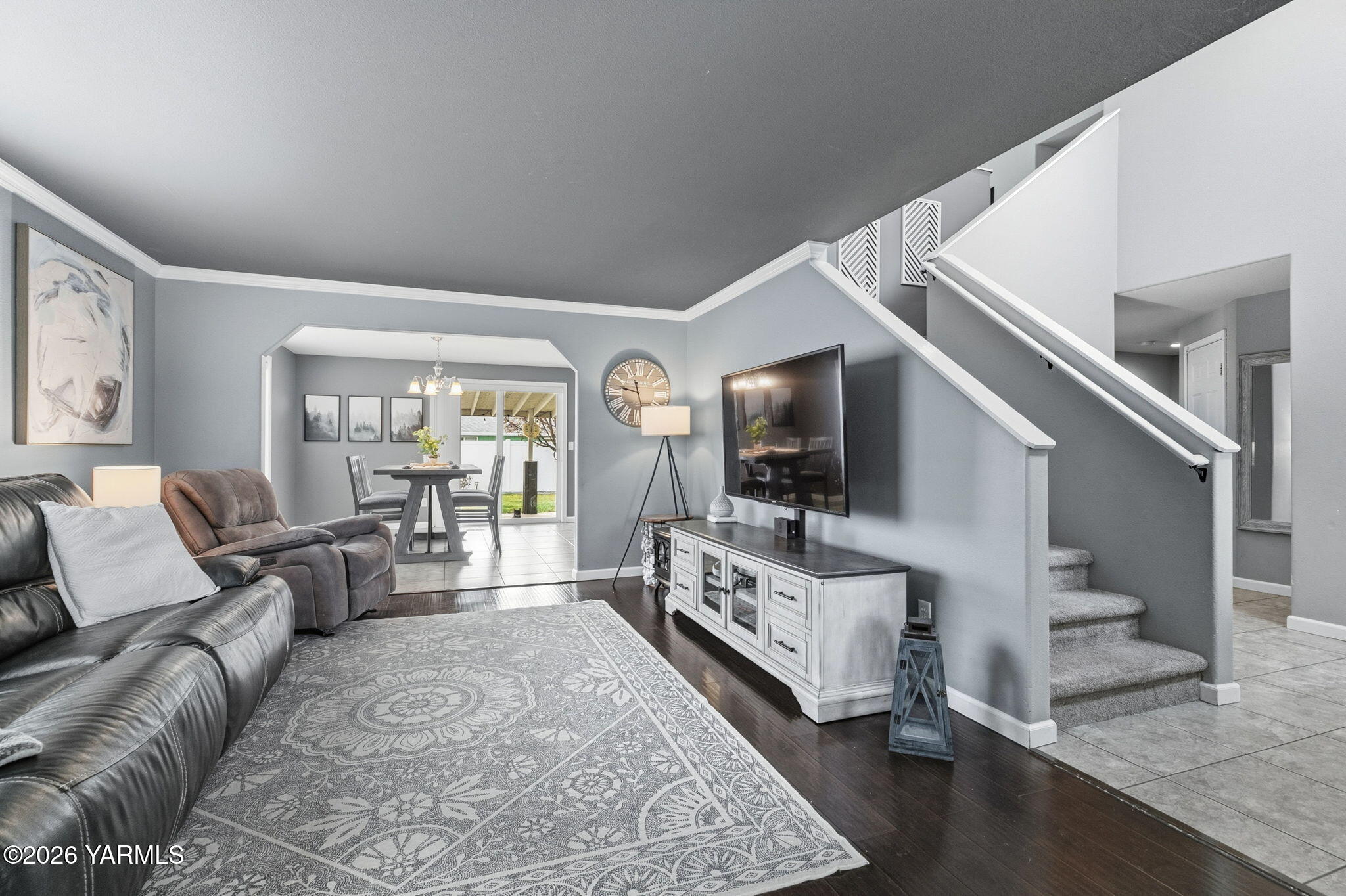 204 Clemans Avenue Moxee, WA 98936 - Photo 6 of 29 a living room with furniture and a flat screen tv