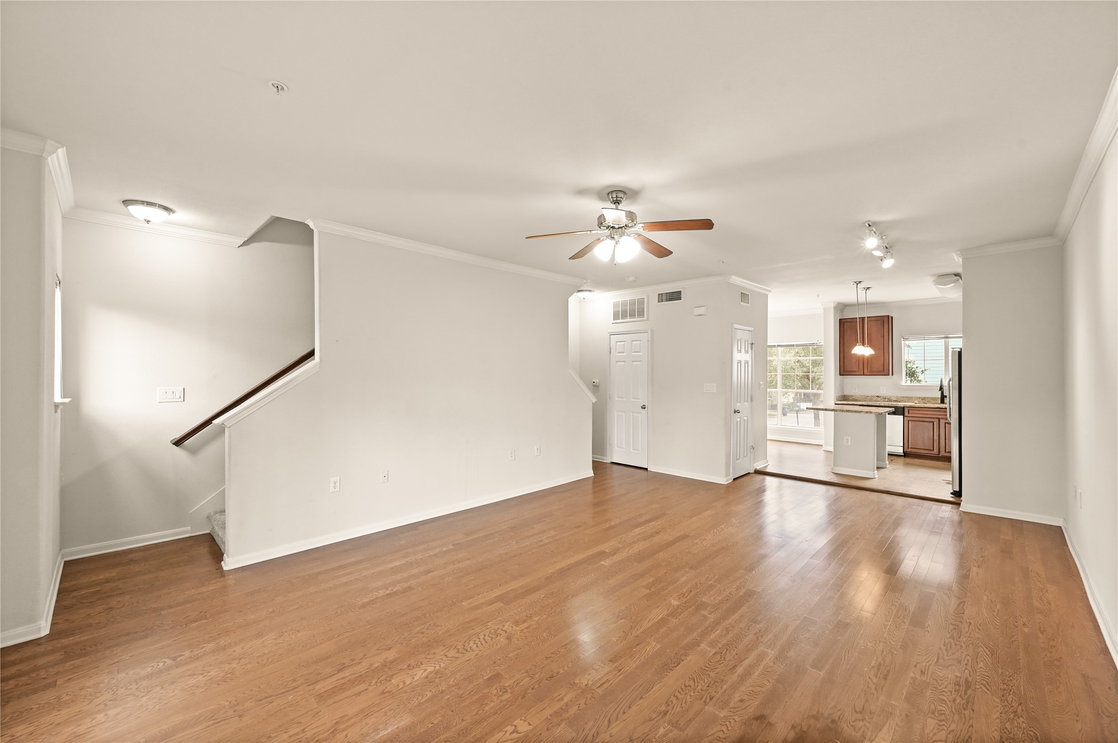 9200 Westheimer Road, Unit 706 Houston, TX 77063 - Photo 3 of 43 a view of a kitchen with a sink and a refrigerator