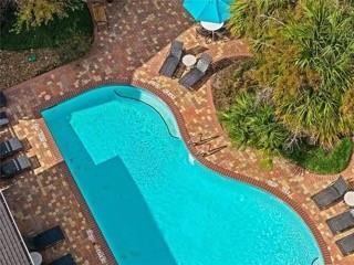 9200 Westheimer Road, Unit 706 Houston, TX 77063 - Photo 35 of 43 a view of a swimming pool with a yard
