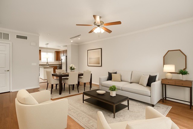 9200 Westheimer Road, Unit 706 Houston, TX 77063 - Photo 4 of 43 a living room with furniture a rug and a window
