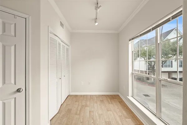 a view of an empty room and window