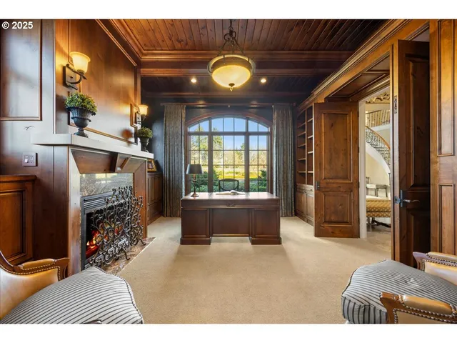 a bedroom with furniture and a window