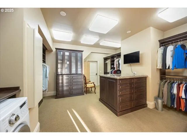 a view of living room with furniture and flat screen tv