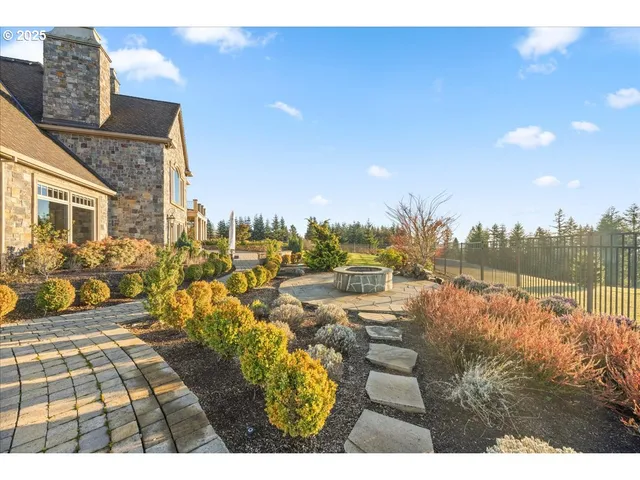 a view of a swimming pool with an outdoor seating