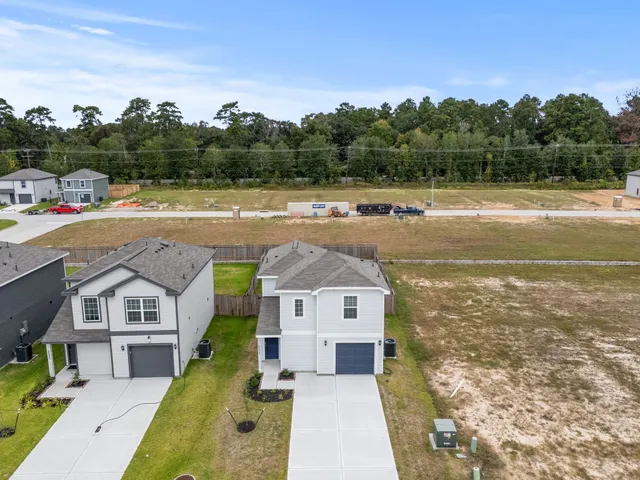 a view of a city with lawn chairs