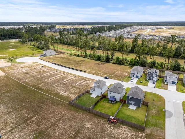 a view of swimming pool with a yard