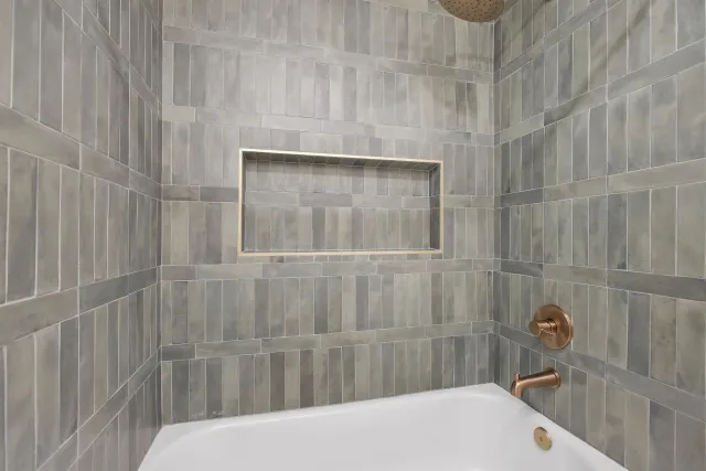 a bathroom with a sink and a shower