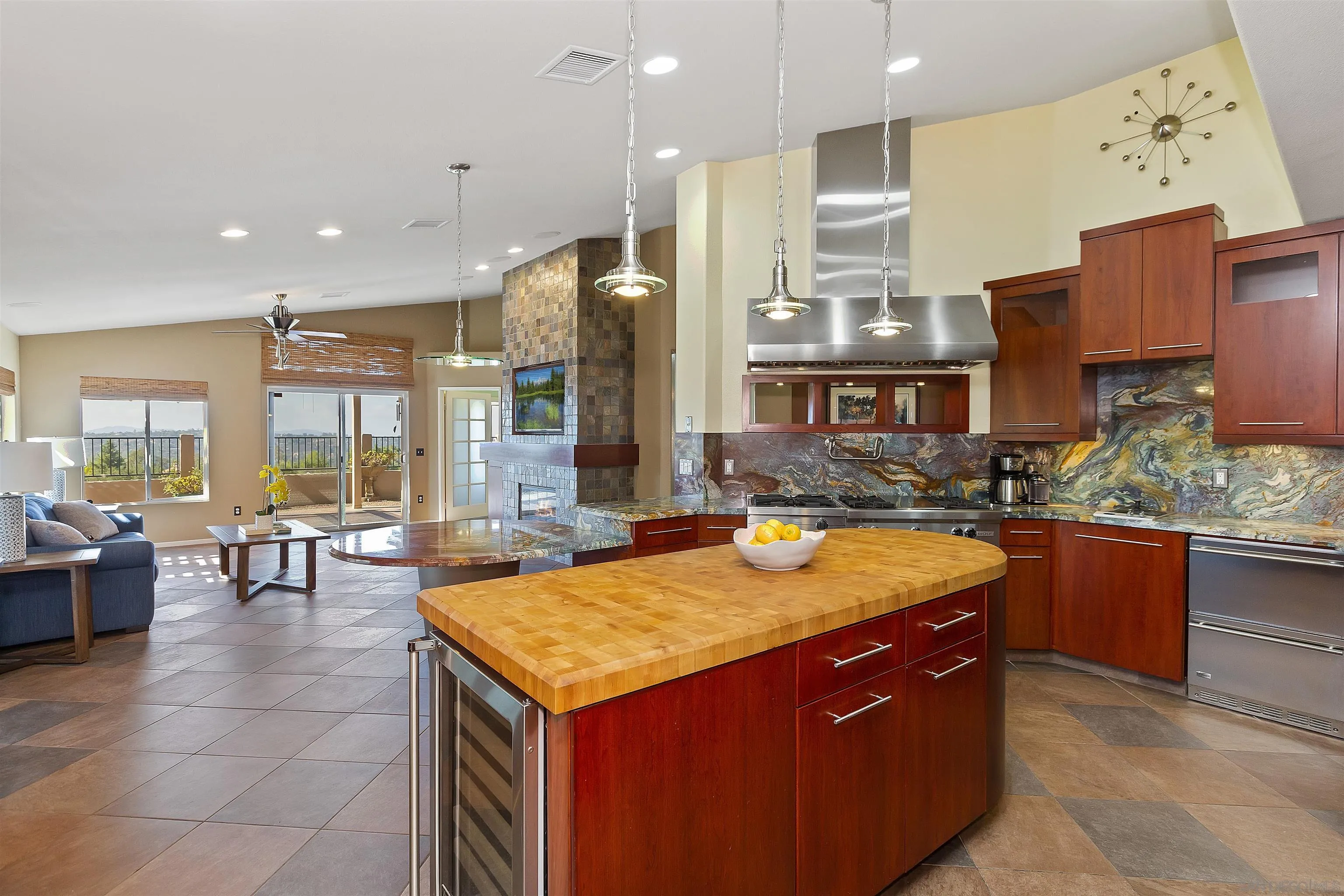 2703 Lobelia Road Alpine, CA 91901 - Photo 12 of 40 a view of kitchen with stainless steel appliances granite countertop a sink and cabinets