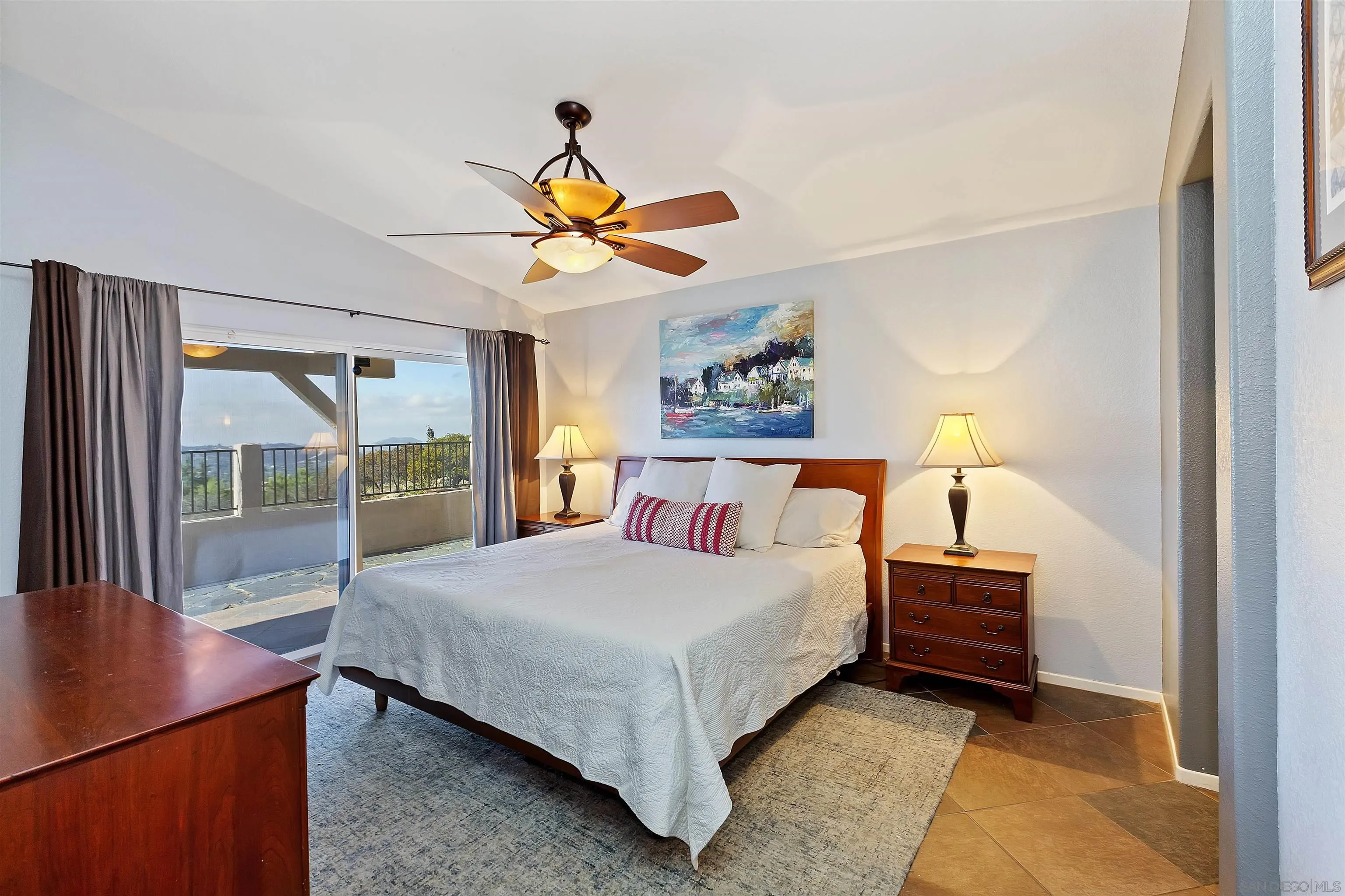 2703 Lobelia Road Alpine, CA 91901 - Photo 18 of 40 a bedroom with a bed and a window