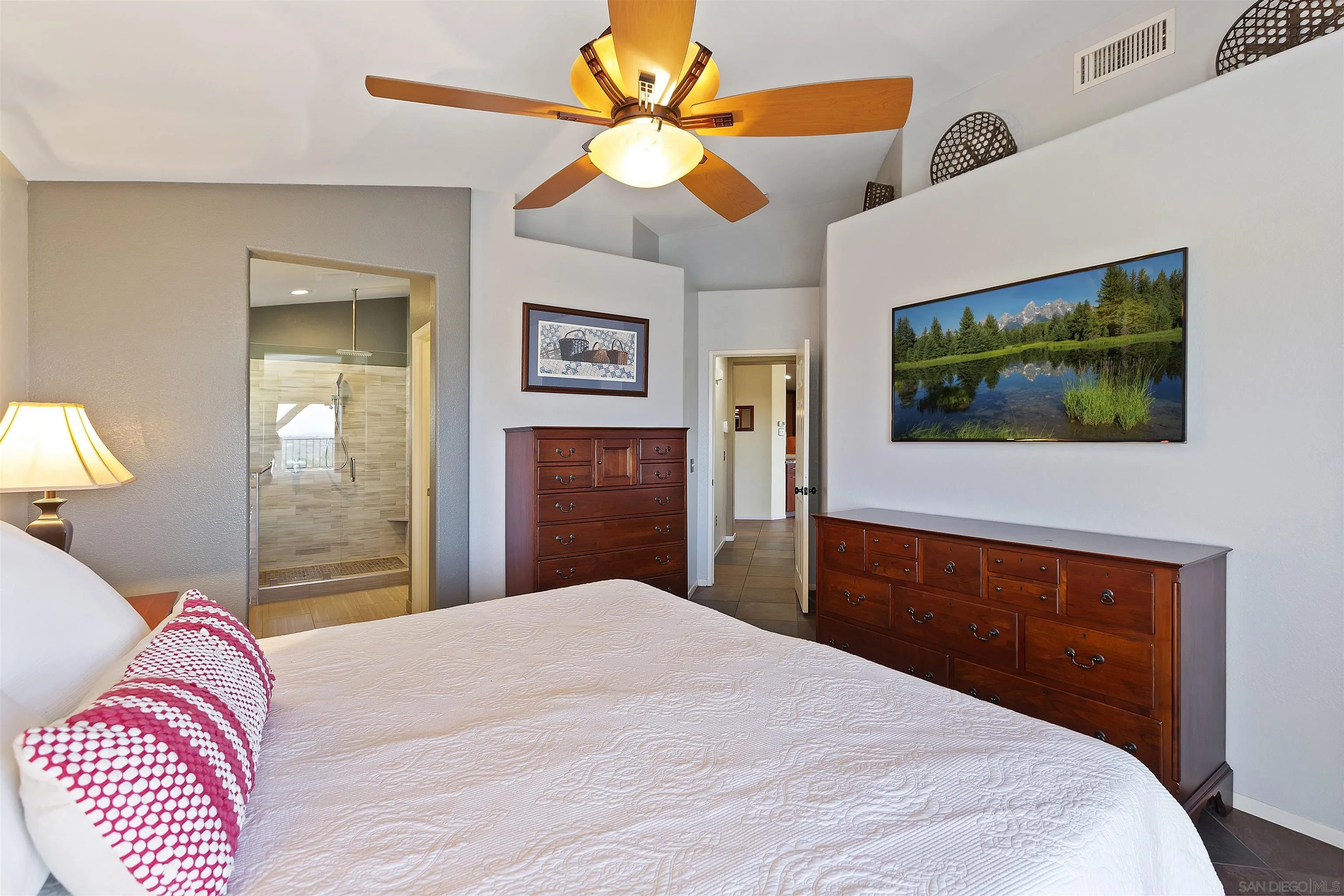 2703 Lobelia Road Alpine, CA 91901 - Photo 19 of 40 a bedroom with a bed and a flat screen tv