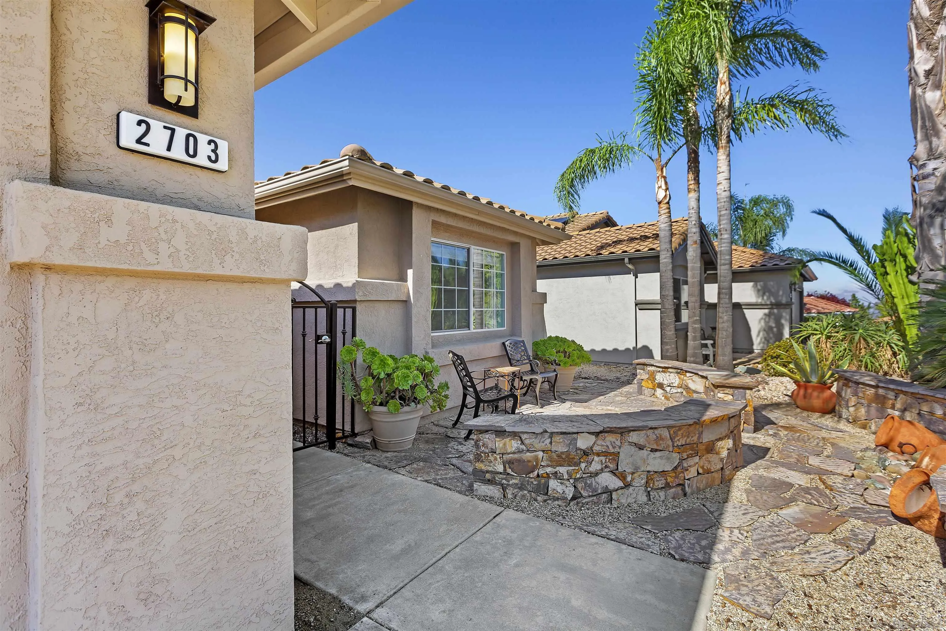 2703 Lobelia Road Alpine, CA 91901 - Photo 2 of 40 a view of a house with a patio