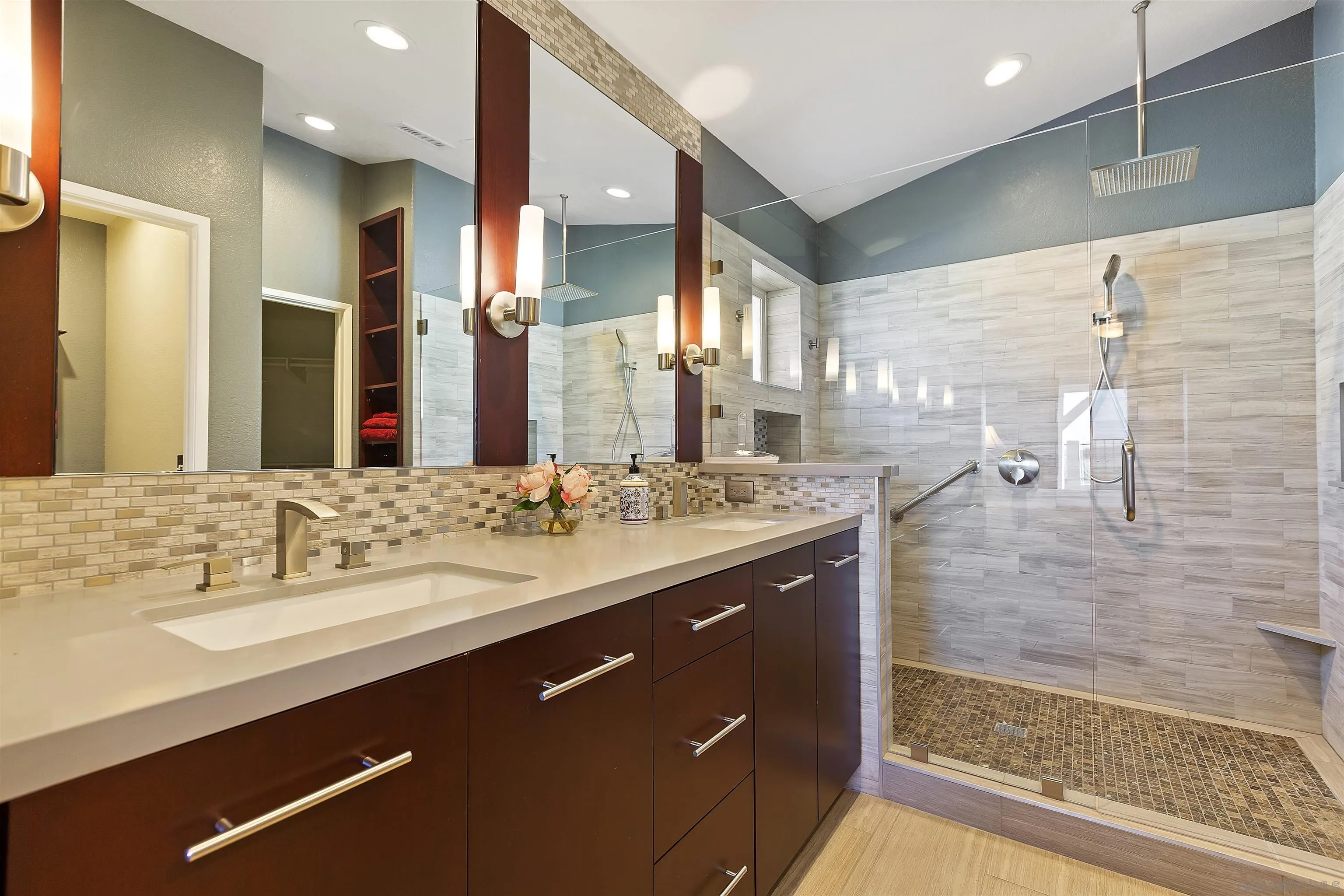 2703 Lobelia Road Alpine, CA 91901 - Photo 22 of 40 a bathroom with a sink and a mirror