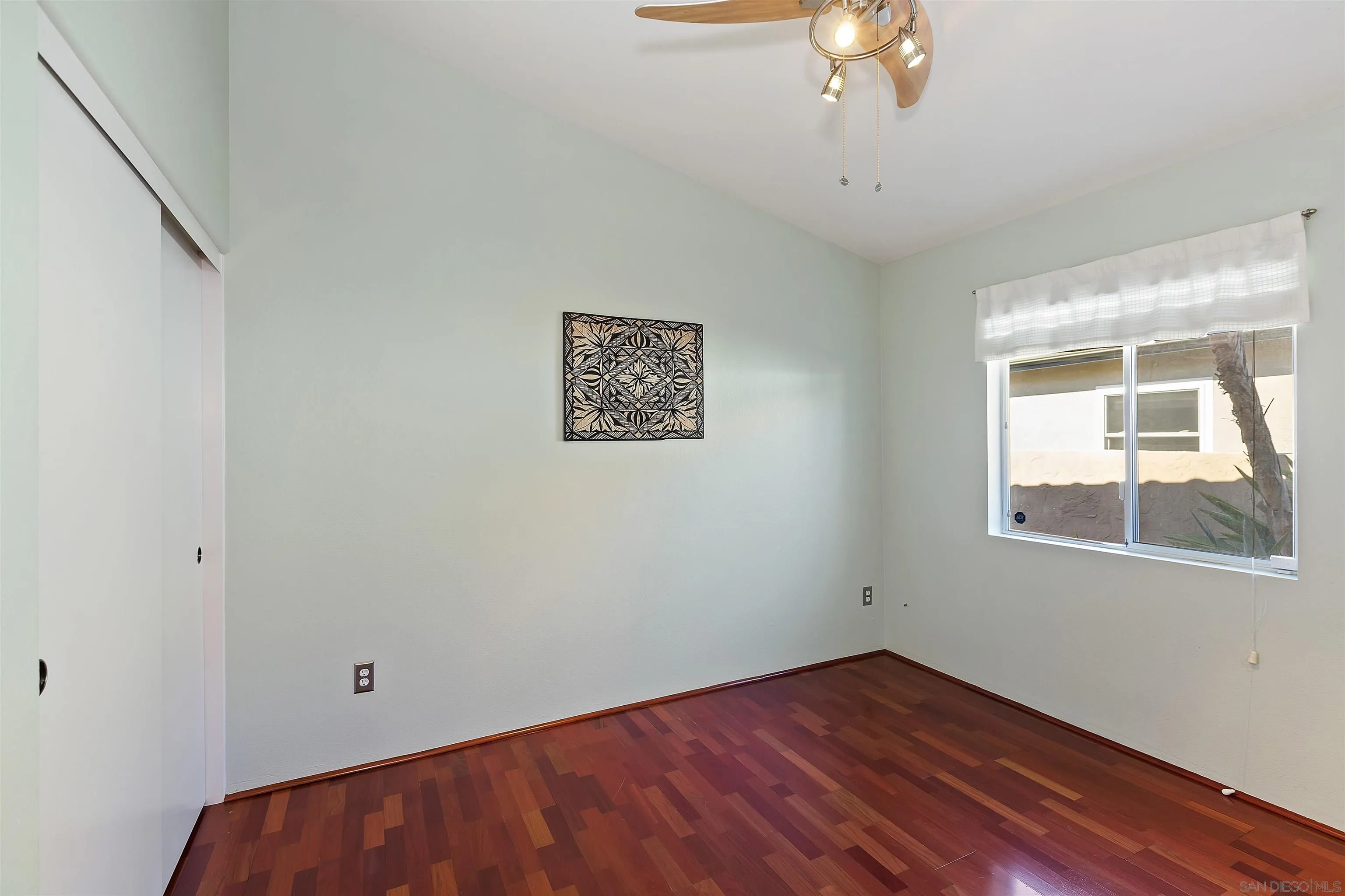 2703 Lobelia Road Alpine, CA 91901 - Photo 23 of 40 a view of empty room with wooden floor