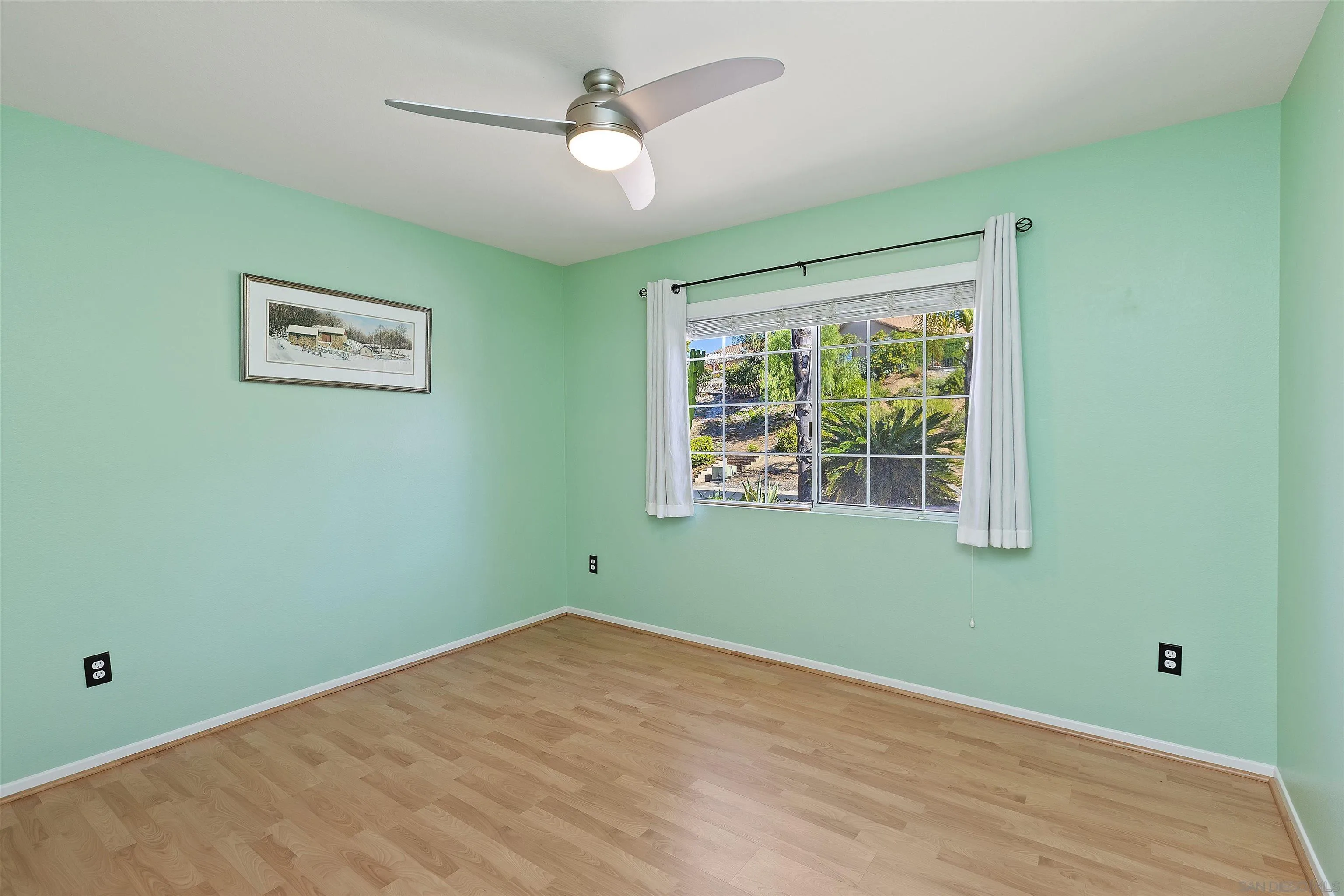 2703 Lobelia Road Alpine, CA 91901 - Photo 25 of 40 a view of empty room with window and ceiling fan