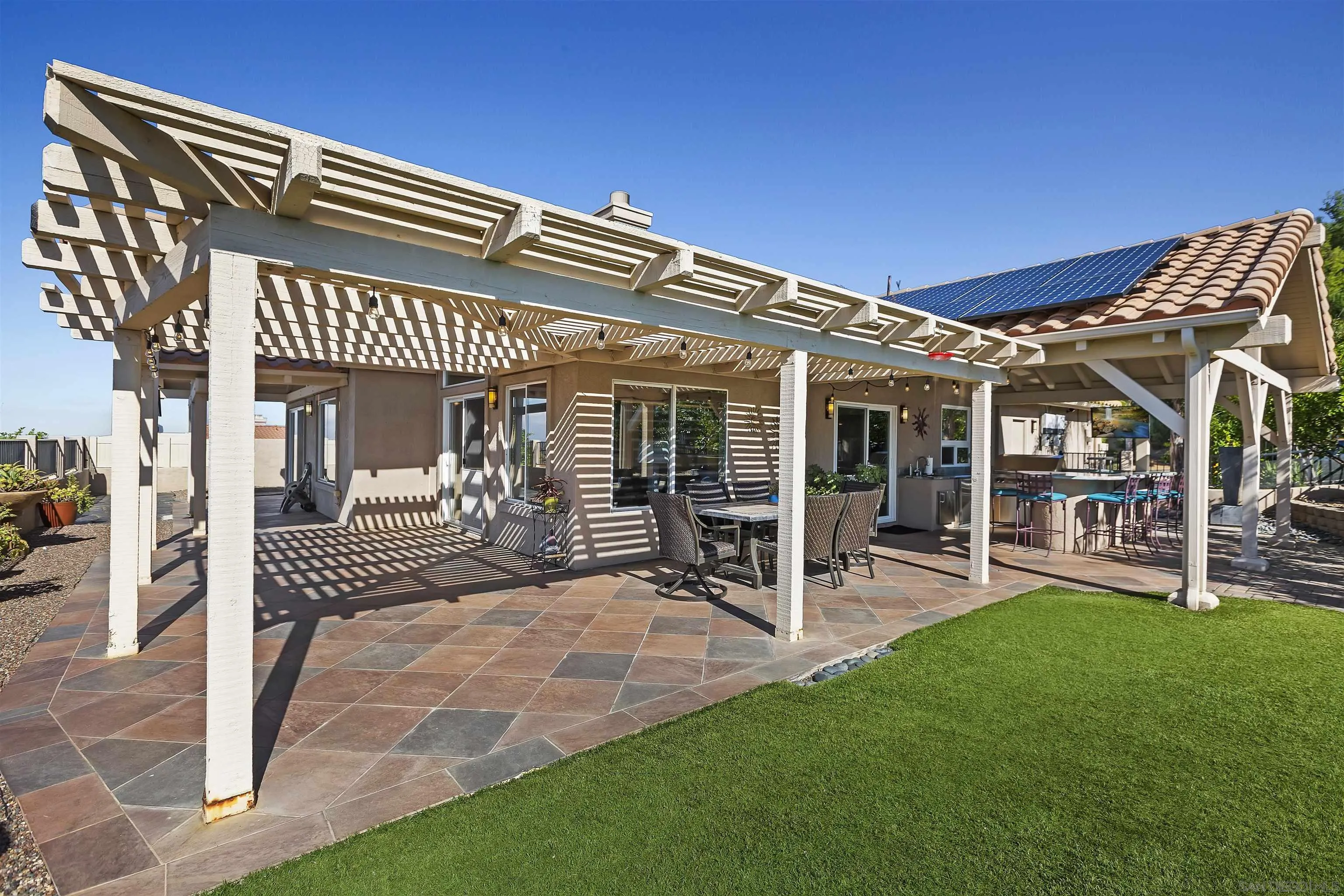 2703 Lobelia Road Alpine, CA 91901 - Photo 29 of 40 a view of a house with a yard porch and sitting area