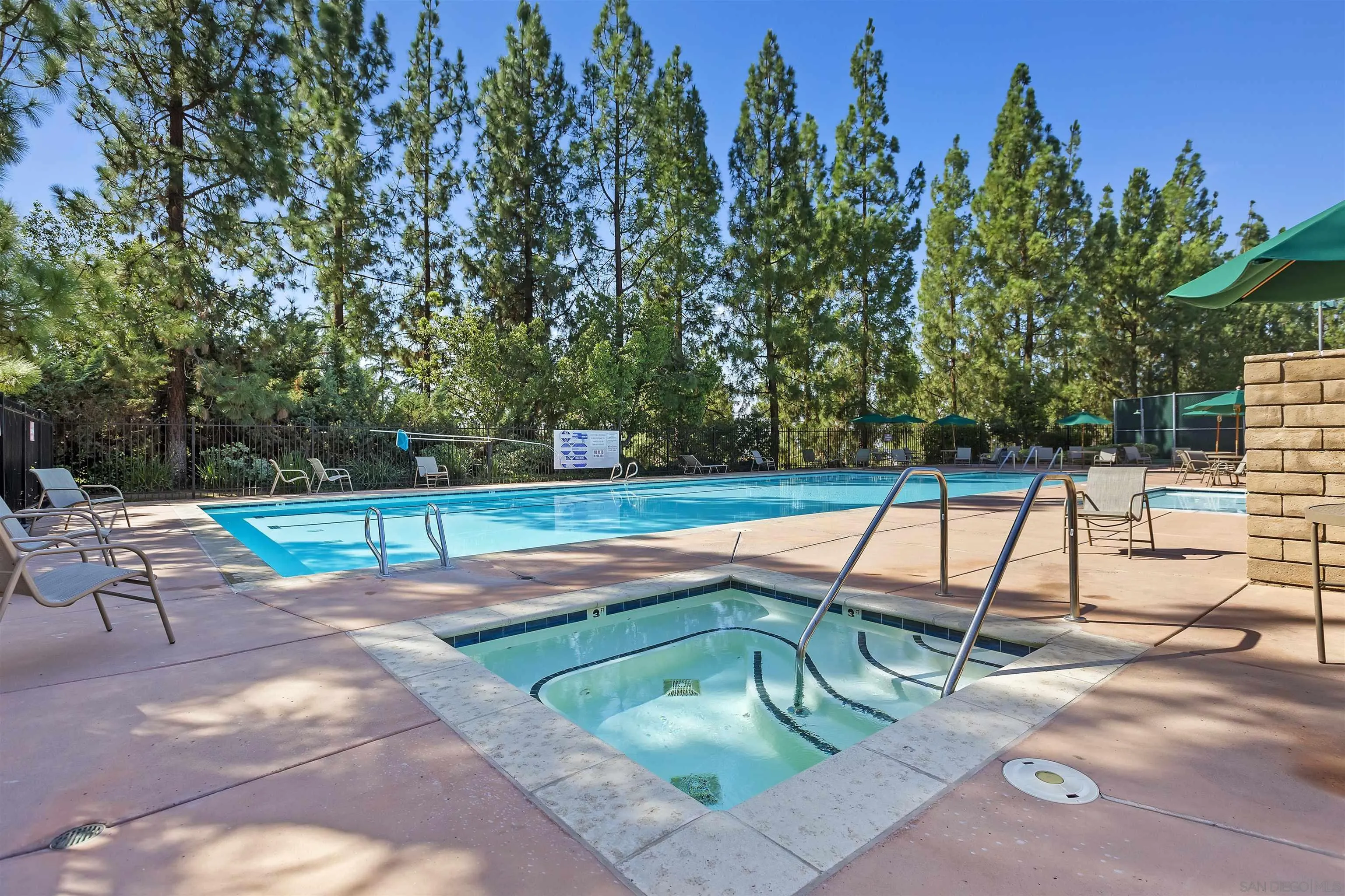 2703 Lobelia Road Alpine, CA 91901 - Photo 38 of 40 a backyard of a house with table and chairs