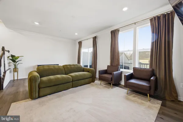 a view of a balcony with wooden floor