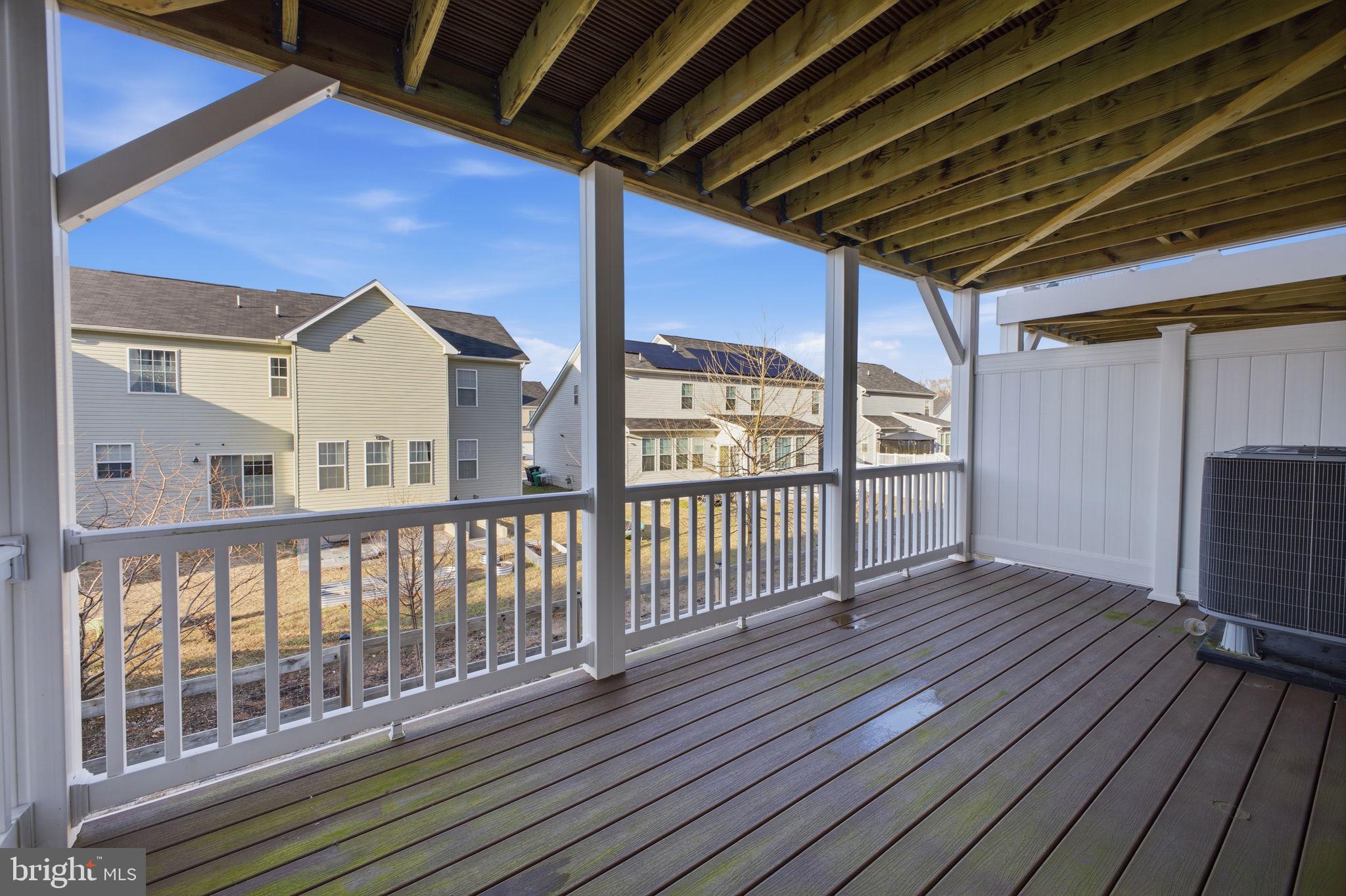 217 Southwind Drive Accokeek, MD 20607 - Photo 17 of 34 a view of a balcony with wooden floor