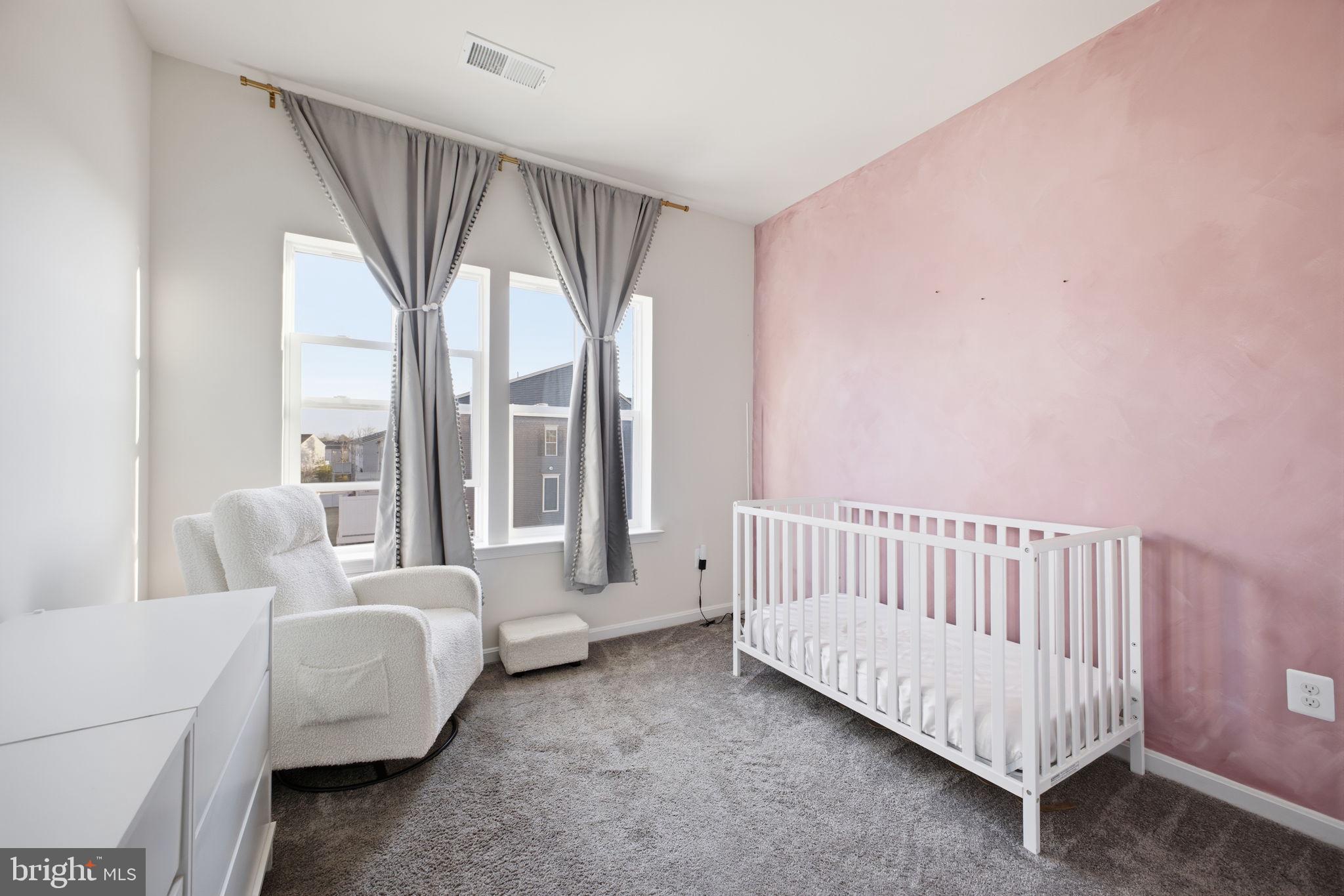 217 Southwind Drive Accokeek, MD 20607 - Photo 29 of 34 a living room with furniture and a large window