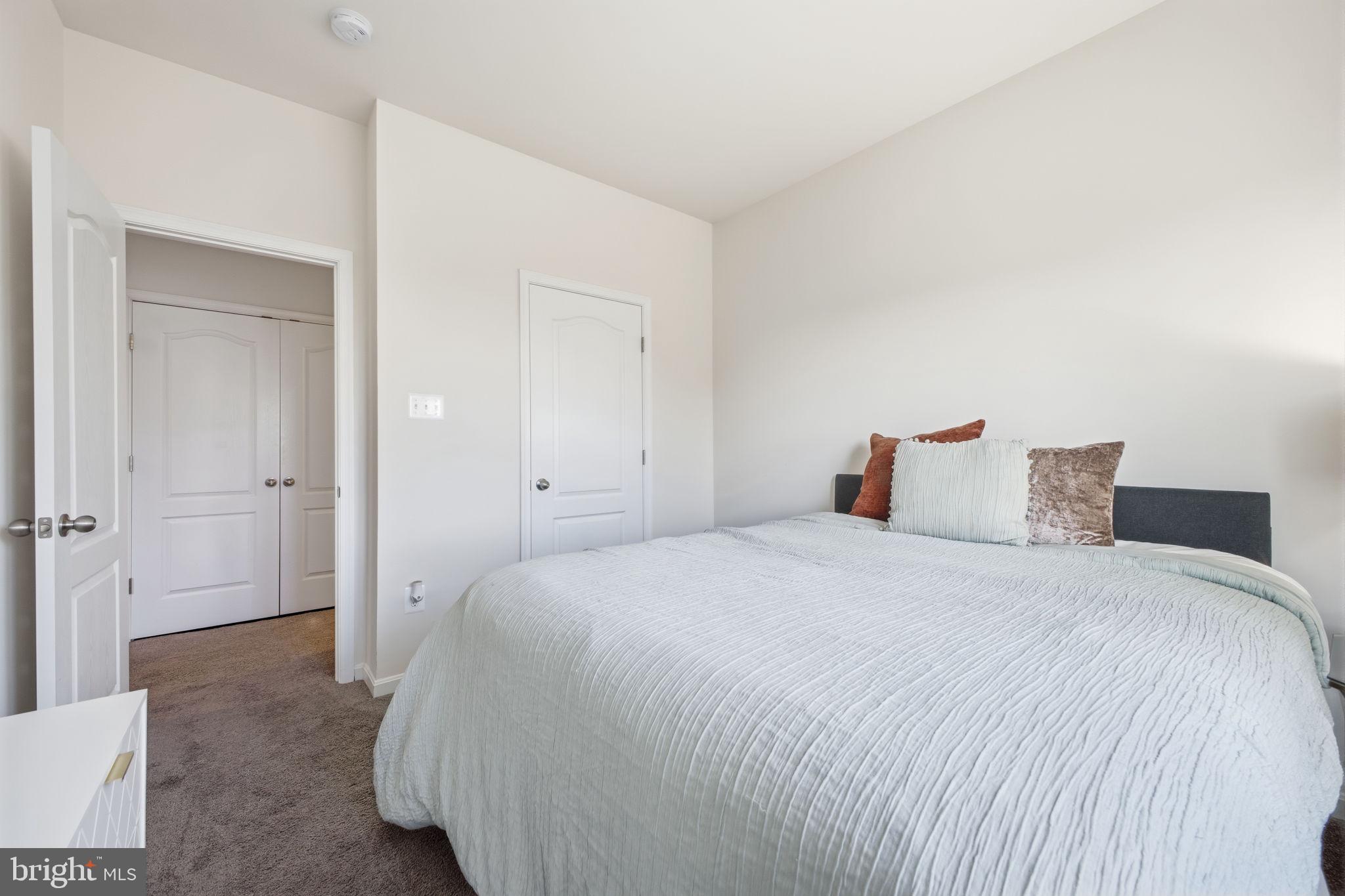 217 Southwind Drive Accokeek, MD 20607 - Photo 31 of 34 a bedroom with a bed and closet