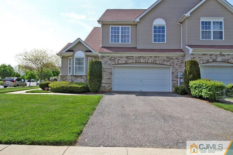 44 Cannon Road Old Bridge, NJ 08857 - Photo 1 of 24 a front view of a house with a yard and garage