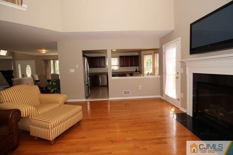 44 Cannon Road Old Bridge, NJ 08857 - Photo 11 of 24 a living room with furniture and a flat screen tv