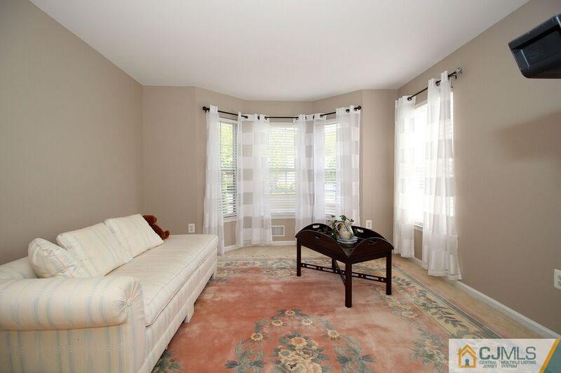 44 Cannon Road Old Bridge, NJ 08857 - Photo 12 of 24 a living room with furniture and a window